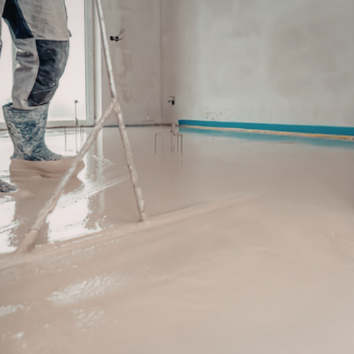 Concrete floor being ground and prepped