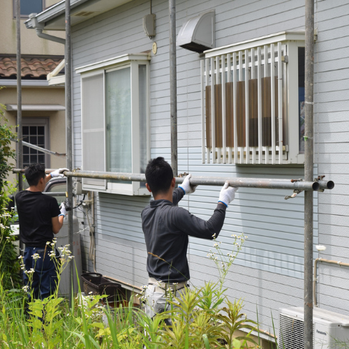 Pressure washing being done with care to protect surfaces